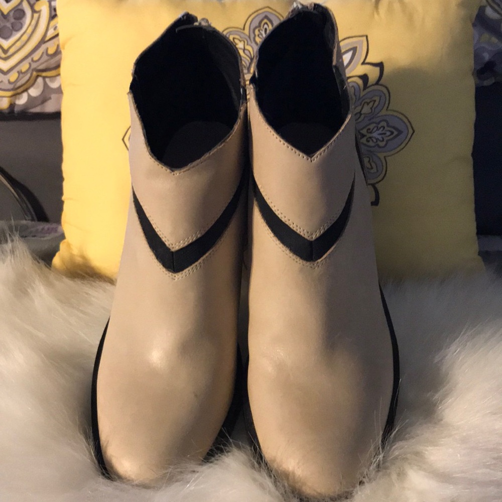 Tan and black booties